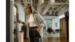 Employees using an office vending machine in Malaysia