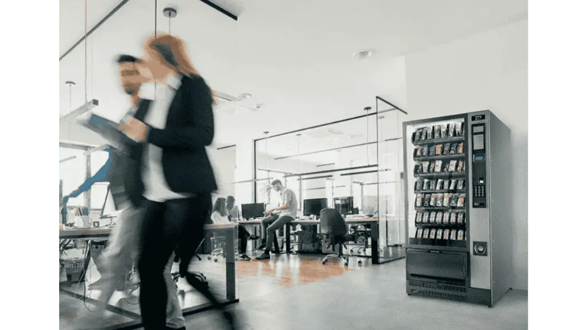 Office Vending Machine with employees in a modern Malaysian corporate office