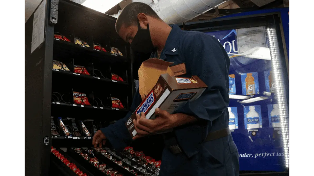 restocking vending machine snacks