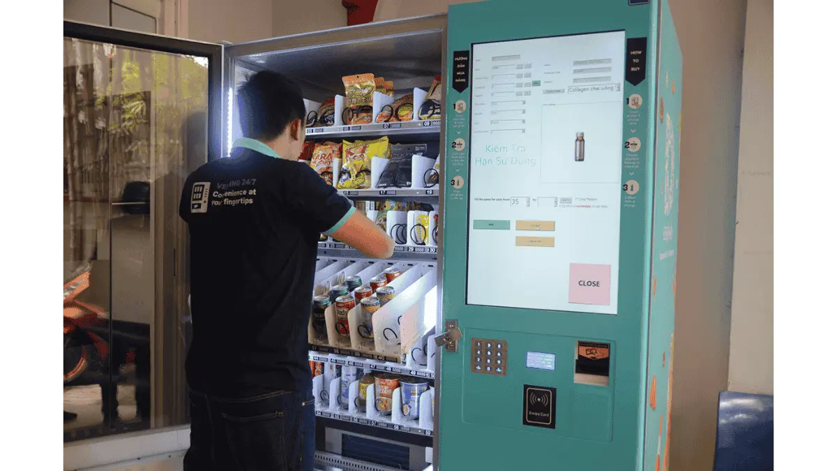 vending machine restocking technician loading products