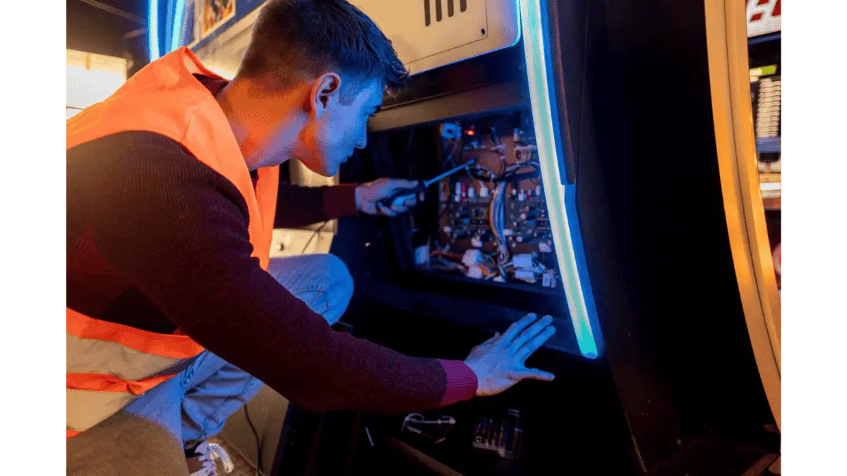 Technician servicing a vending machine